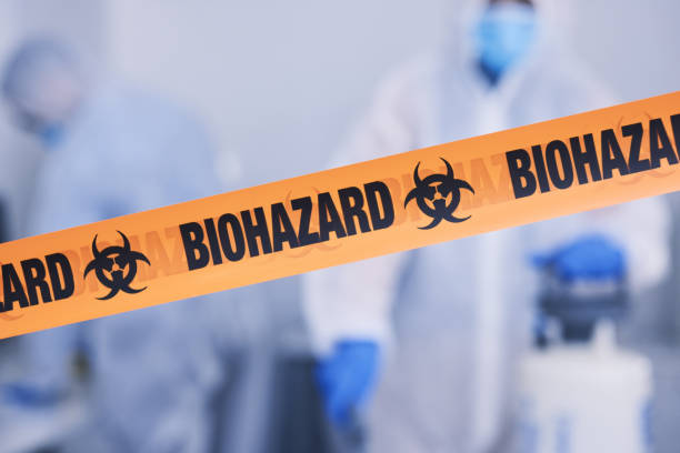 Professional Biohazard Cleanup technician working in Roslindale, MA